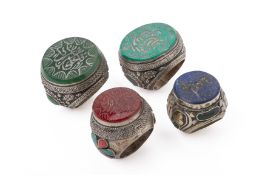 FOUR LARGE ISLAMIC INTAGLIO SEAL RINGS