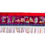 A VERY LONG EMBROIDERED AND TASSELED VALANCE