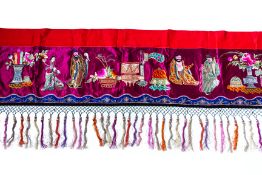 A VERY LONG EMBROIDERED AND TASSELED VALANCE