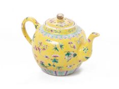 A CHINESE YELLOW GROUND FAMILLE ROSE PORCELAIN TEAPOT