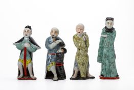 A GROUP OF FOUR CHINESE PORCELAIN FIGURES