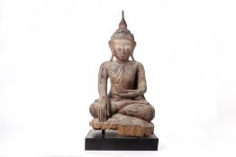 A LARGE SOUTHEAST ASIAN CARVED WOOD FIGURE OF BUDDHA