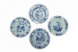 A GROUP OF FOUR CHINESE EXPORT BLUE AND WHITE PLATES