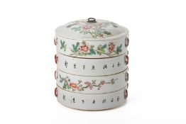 A FAMILLLE ROSE PORCELAIN FOUR TIERED BOX