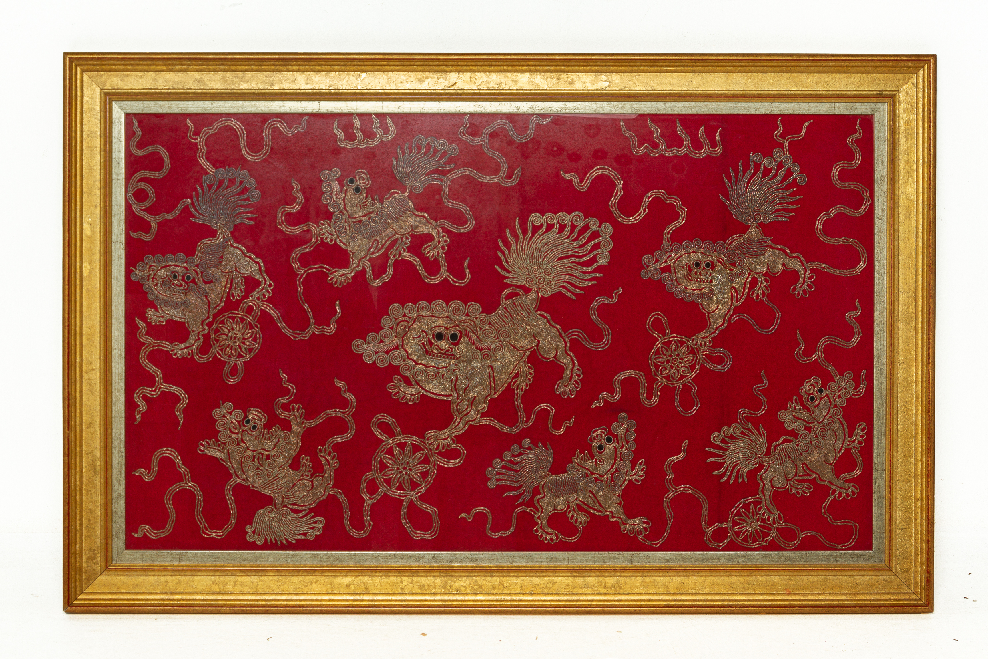 A FRAMED EMBROIDERED PANEL