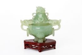 A CARVED JADE TRIPOD CENSER AND COVER