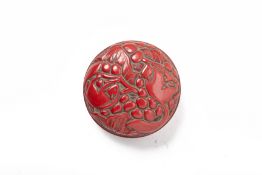 A SMALL CARVED CINNABAR LACQUER CIRCULAR BOX