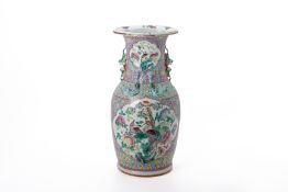 A FAMILLE ROSE TWIN HANDLED PORCELAIN VASE