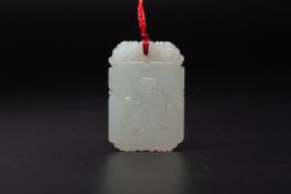 A CARVED PALE CELADON JADE RECTANGULAR PENDANT PLAQUE