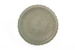 A MOULDED CELADON BOWL