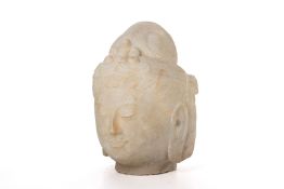 A CHINESE CARVED WHITE MARBLE HEAD OF GUANYIN