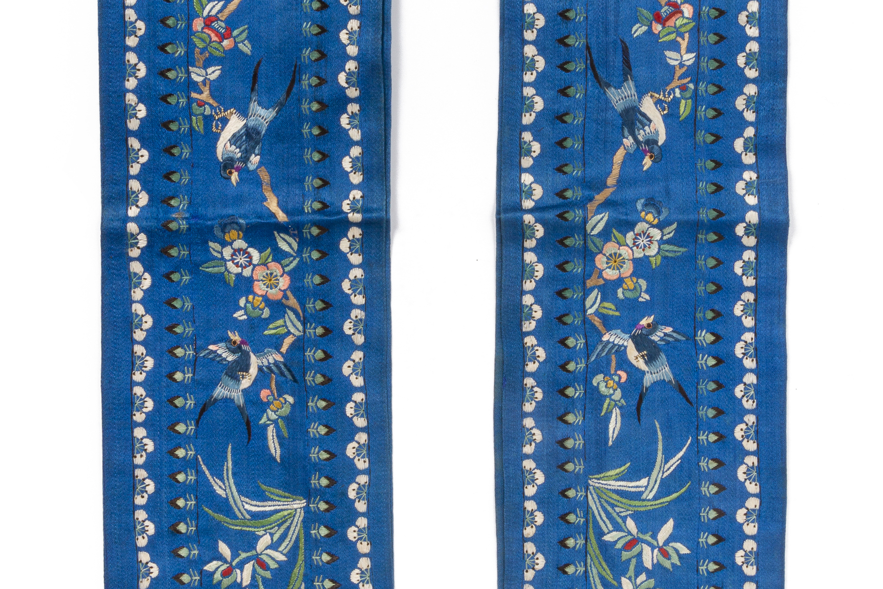 A PAIR OF CHINESE EMBROIDERED SLEEVE PANELS