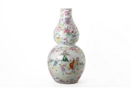 A FAMILLE ROSE MILLEFLEUR DOUBLE GOURD PORCELAIN VASE