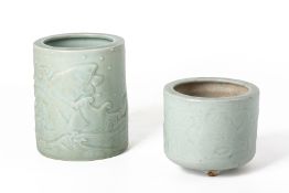 TWO MOULDED CELADON BRUSH POTS