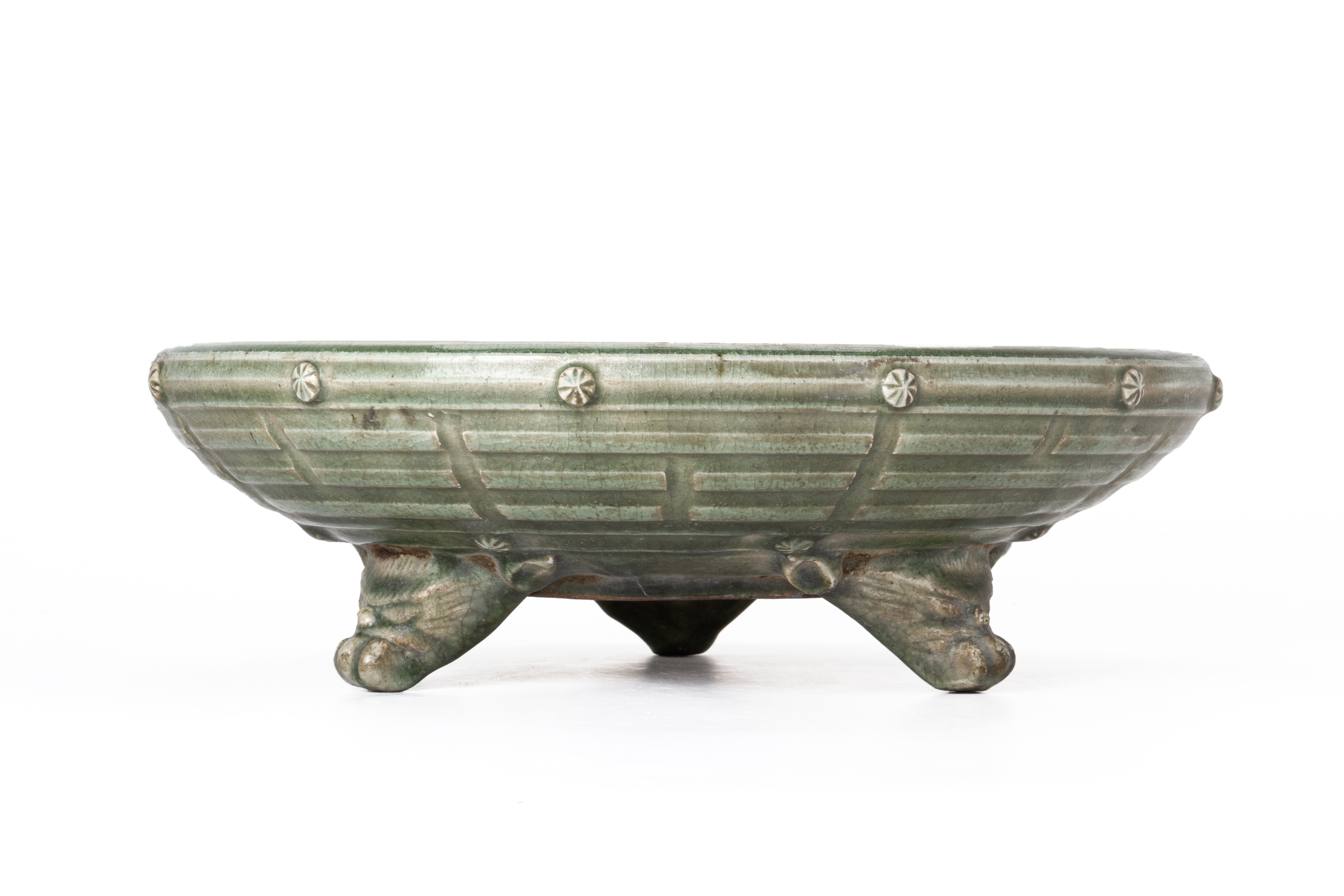 A LARGE CELADON EIGHT TRIGRAMS TRIPOD CENSER