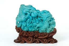 A CHINESE TURQUOISE CARVING OF DRAGONS
