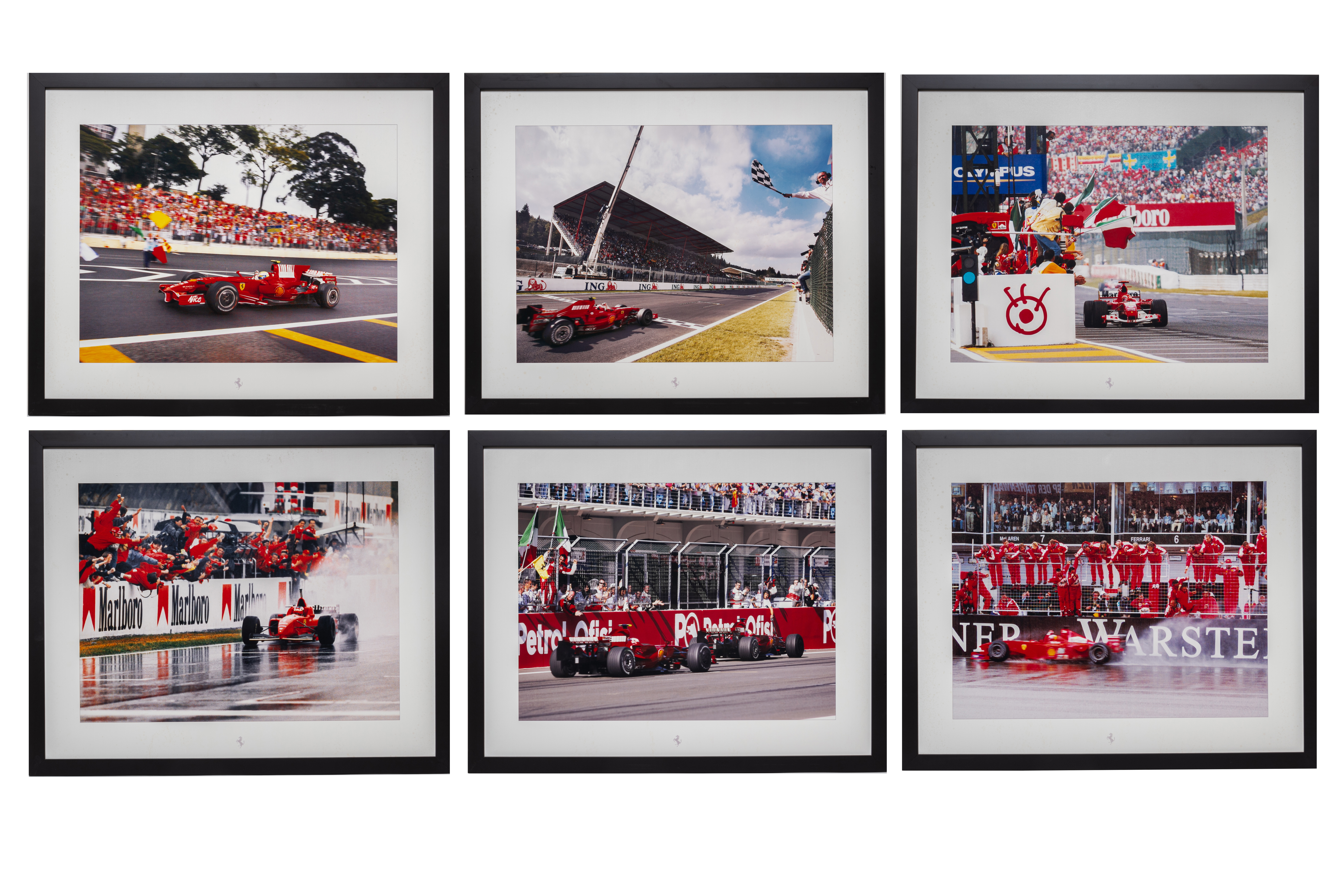 A SET OF SIX FERRARI LIMITED EDITION PHOTOGRAPHIC PRINTS