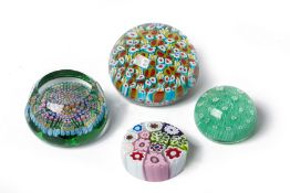 A GROUP OF FOUR MILLEFIORE GLASS PAPERWEIGHTS