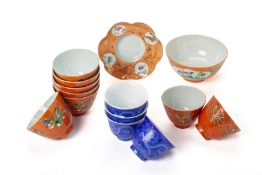 A GROUP OF CORAL RED AND BLUE SGRAFFITO PORCELAIN TEABOWLS
