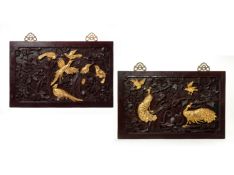 A PAIR OF CHINESE CARVED WOOD PANELS