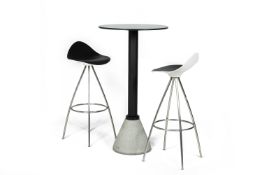 A BISTRO TABLE BY KONSTANTIN GRCIC FOR MAGIS