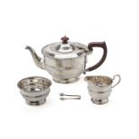 AN ENGLISH SILVER THREE PIECE TEA SERVICE