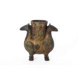 AN ARCHAIC STYLE BRONZE TWIN RAM VESSEL