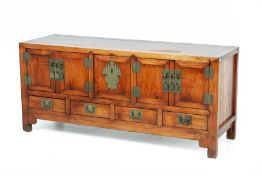 A CHINESE BRASS BOUND LOW SIDEBOARD