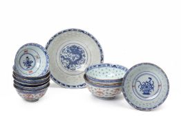 A GROUP OF RICE PATTERN BOWLS AND TEABOWLS