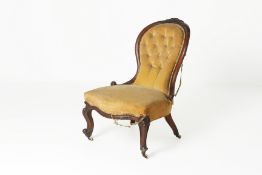 A VICTORIAN MAHOGANY NURSING CHAIR