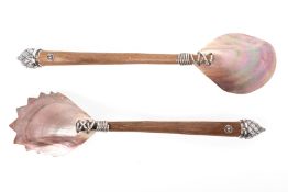 A PAIR OF SALAD SERVERS BY LOTUS ARTS DE VIVRE