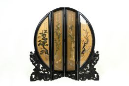 A BLACK LACQUER AND HARD STONE INLAID FOUR FOLD SCREEN
