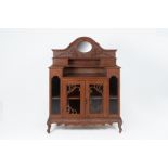 A CARVED PERANAKAN SIDE CABINET