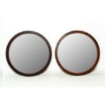 A PAIR OF CIRCULAR MIRRORS