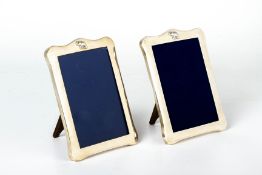 A PAIR OF SILVER PHOTO FRAMES