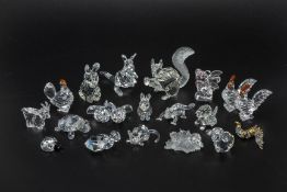 A COLLECTION OF SWAROVSKI MINIATURE ANIMALS AND INSECTS