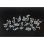 A COLLECTION OF SWAROVSKI MINIATURE ANIMALS AND INSECTS