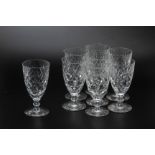 A SET OF EIGHT ROYAL DOULTON CUT CRYSTAL WINE GLASSES