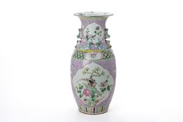 A FAMILLE ROSE TWIN HANDLED PORCELAIN VASE