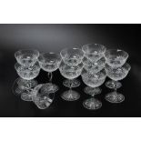 A SET OF ELEVEN CUT GLASS CHAMPAGNE COUPES