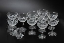 A SET OF ELEVEN CUT GLASS CHAMPAGNE COUPES