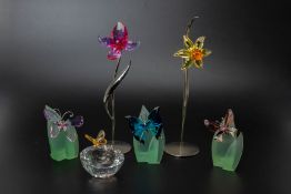 A COLLECTION OF SWAROVSKI BUTTERFLIES AND FLOWERS