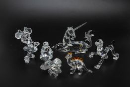 A COLLECTION OF SWAROVSKI DISNEY & FAIRY TALE FIGURINES