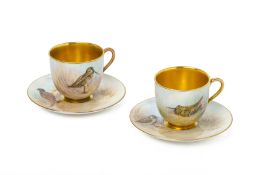 A PAIR OF ROYAL WORCESTER COFFEE CUPS AND SAUCERS