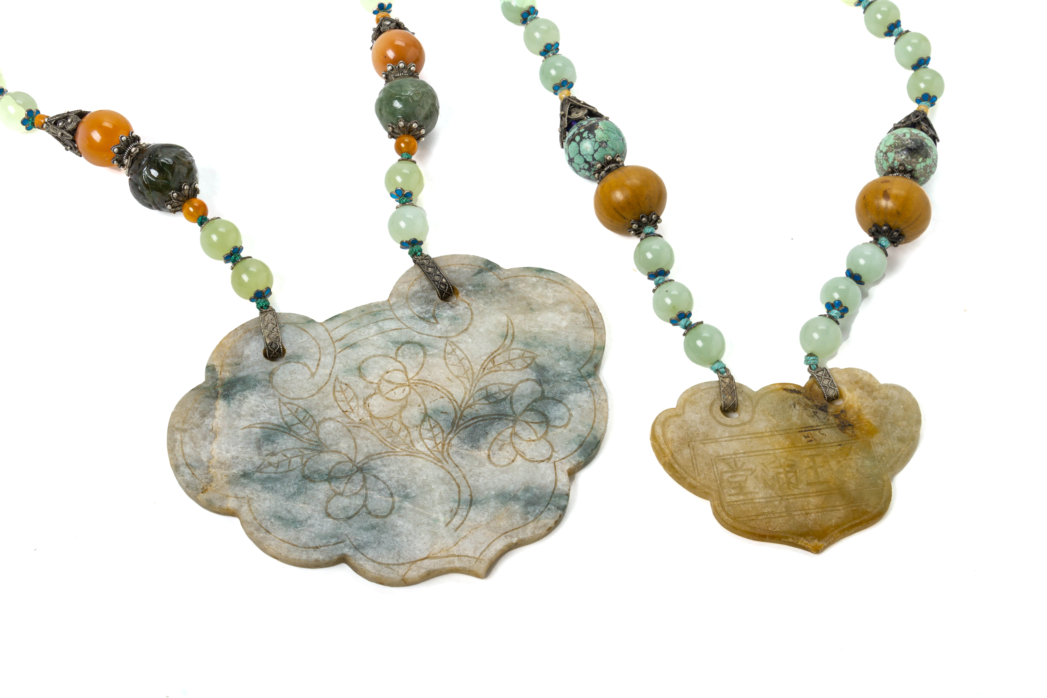 TWO LARGE CARVED HARDSTONE NECKLACES