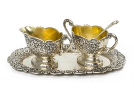 A SILVER CREAMER AND SUGAR SET WITH TRAY AND SPOON