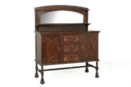 AN INDONESIAN CARVED WOOD SIDEBOARD