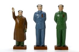 THREE POLYCHROME PORCELAIN FIGURES OF CHAIRMAN MAO