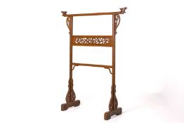 A CHINESE RED LACQUER CLOTHES STAND