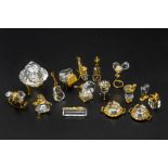 A COLLECTION OF SWAROVSKI MINIATURE GILDED CRYSTAL ITEMS